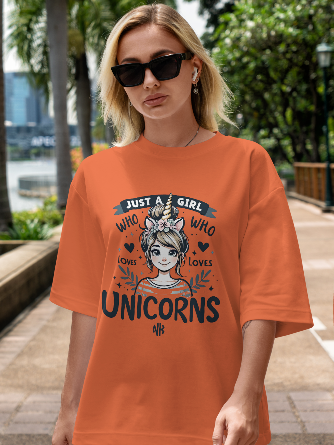 Women's Oversized T-shirt with 'Just a girl who loves unicorns' Design – Coral Color Option